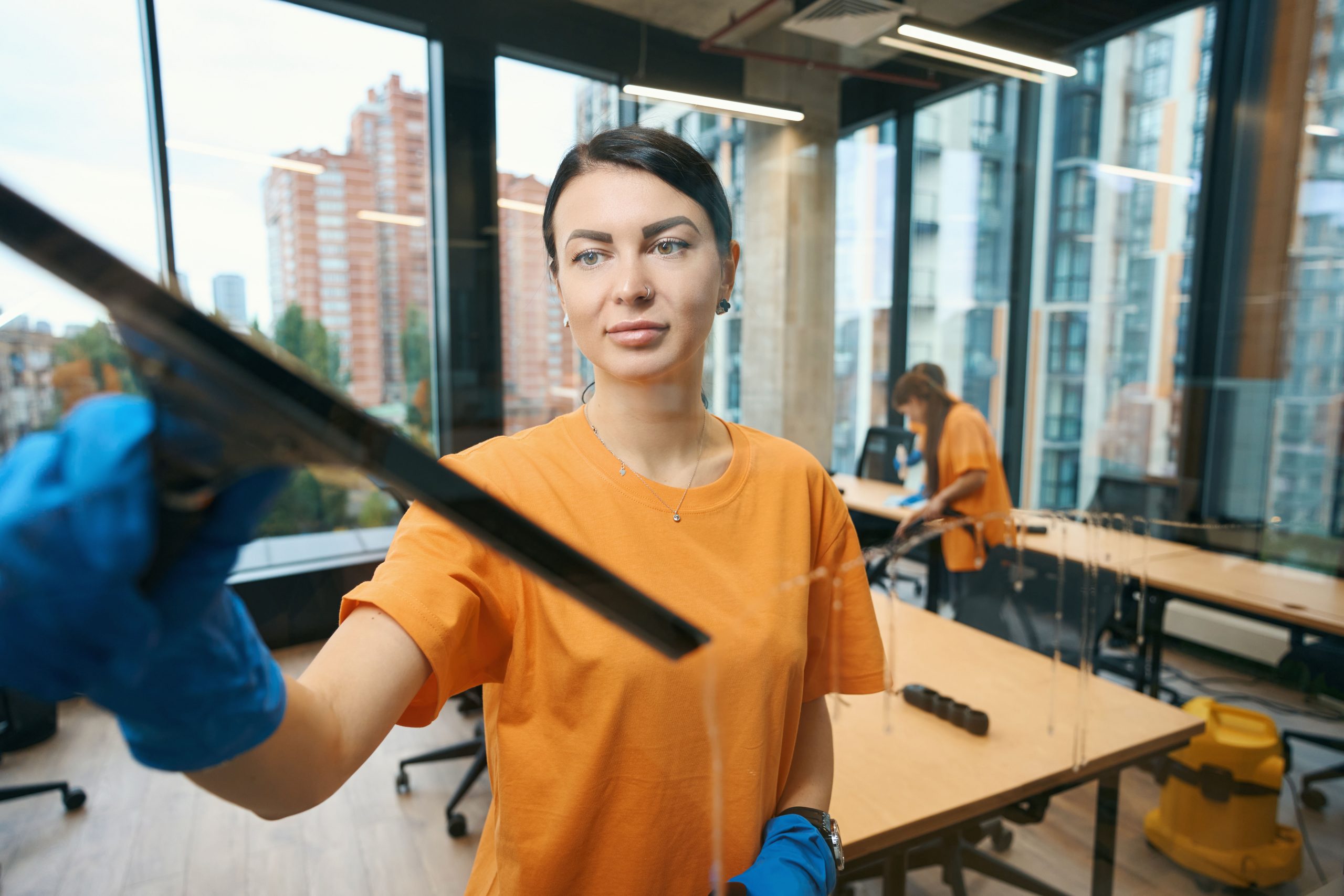 cleaning-company-workers-use-different-gadgets-whi-2022-11-23-06-19-37-utc